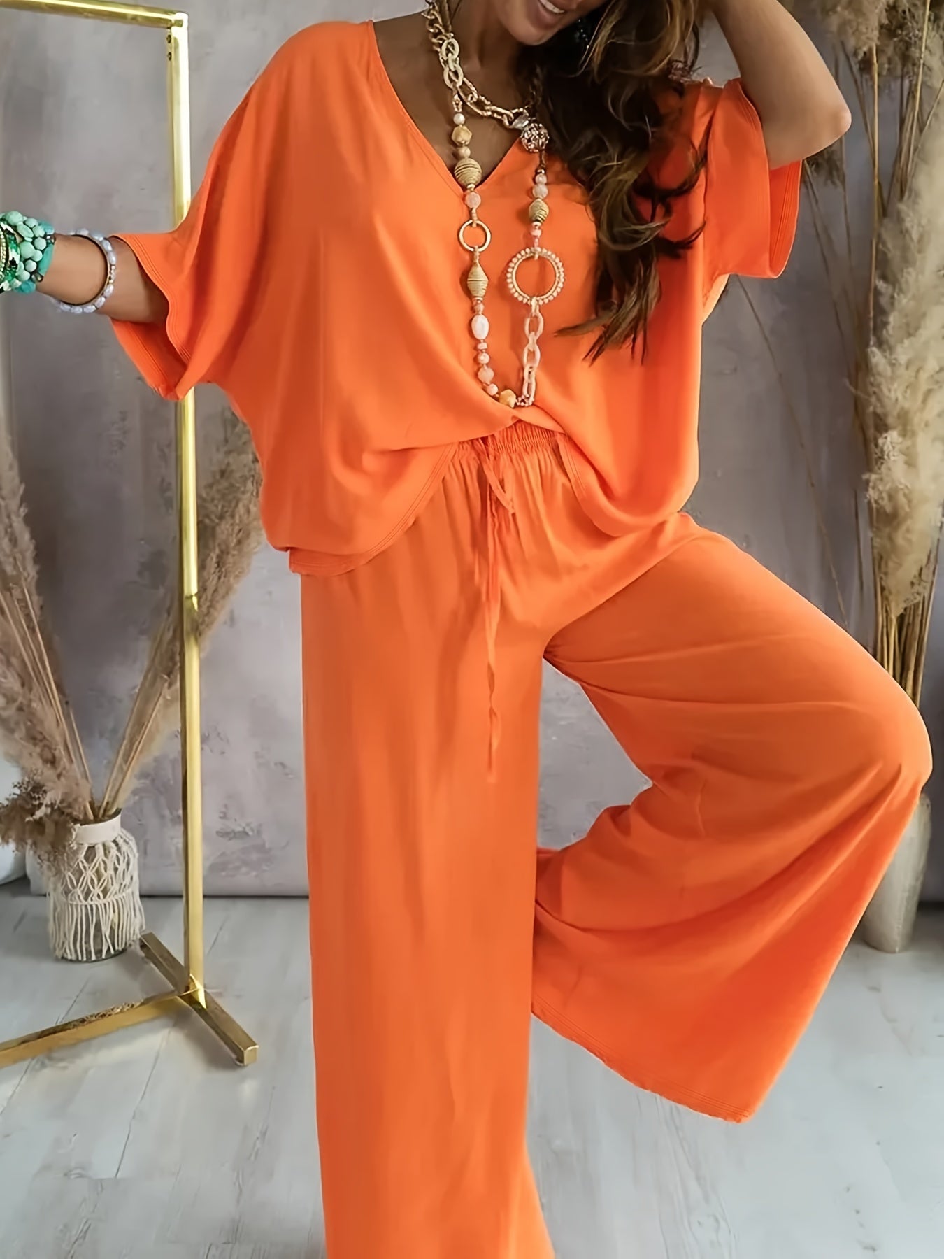 Giselora | Top met halve mouwen met V-hals & Broek met wijde pijpen voor dames