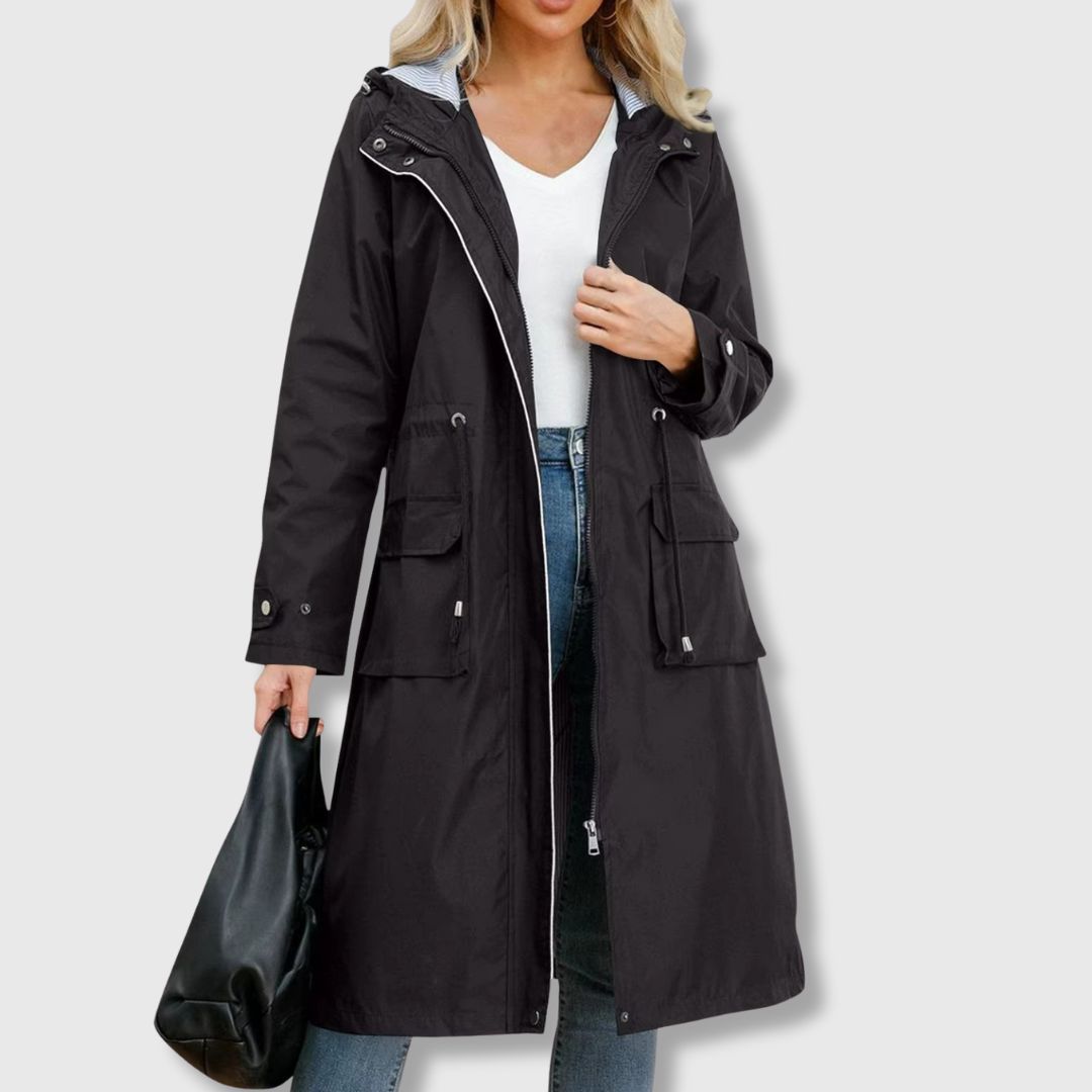 Benigna | Lange regenjas met capuchon voor dames – Waterdichte, casual outdoorjas met capuchon