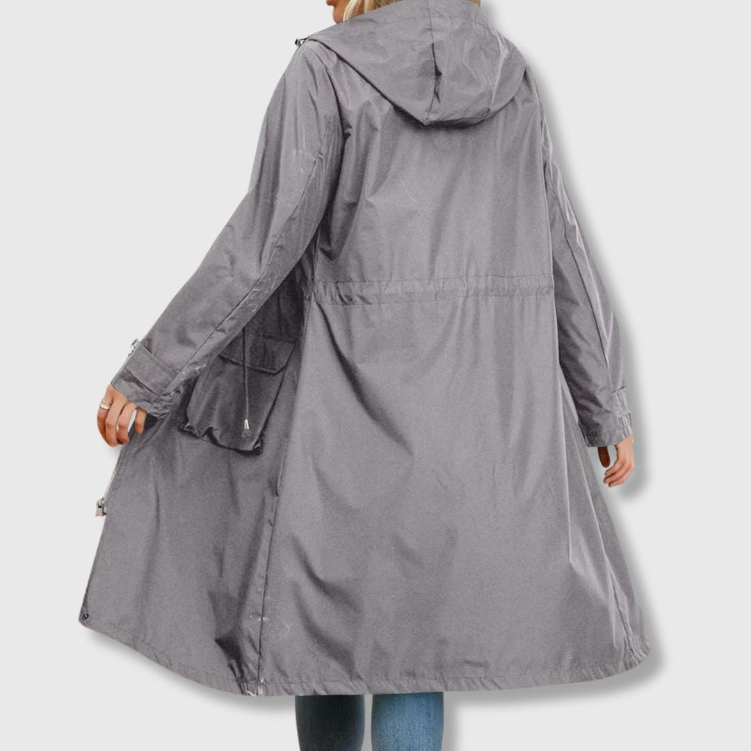 Benigna | Lange regenjas met capuchon voor dames – Waterdichte, casual outdoorjas met capuchon