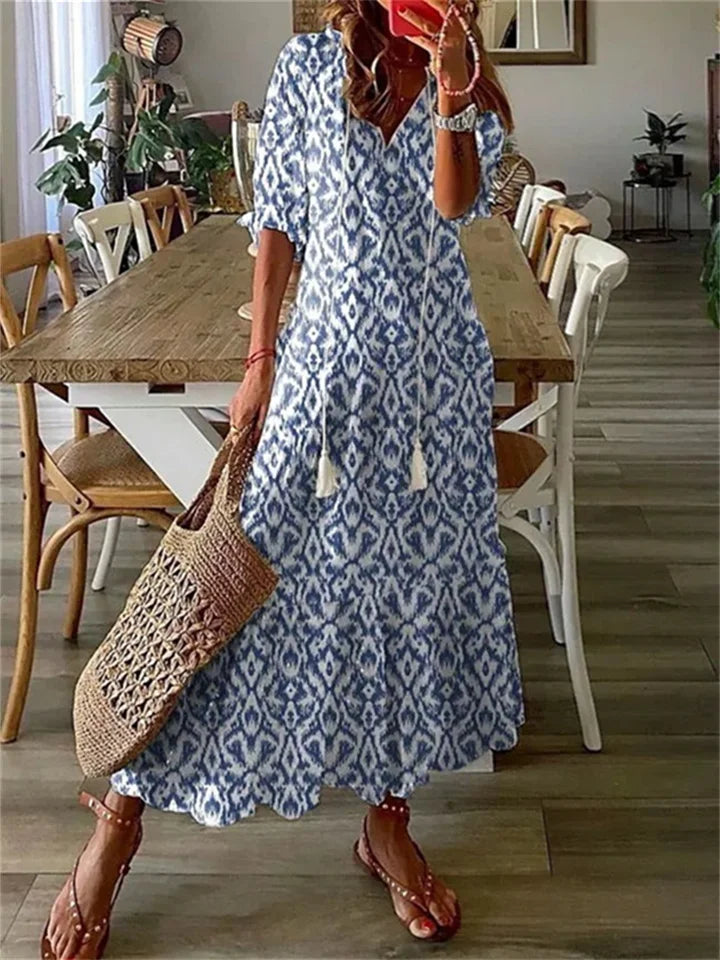 Tazira | Boho Maxi jurk met bloemen - Halflange mouwen, vloeiende relaxte zomerjurk