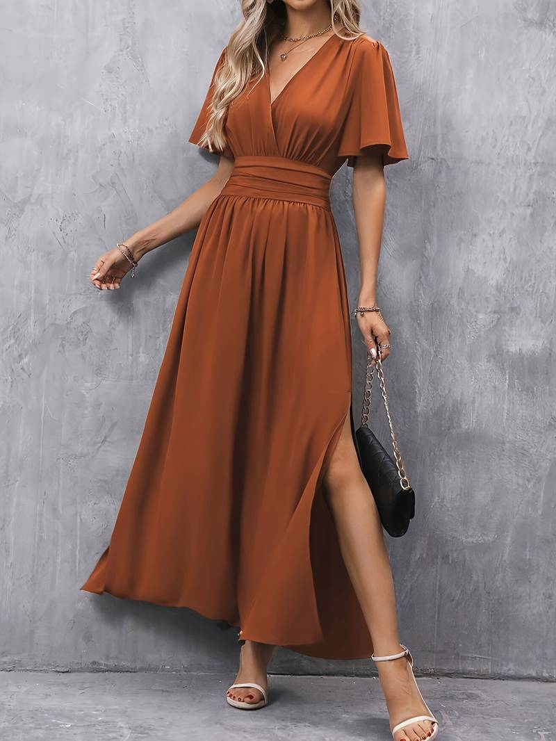 Taina | Elegante lange vloeiende damesjurk met split aan de zijkant en klokmouwen