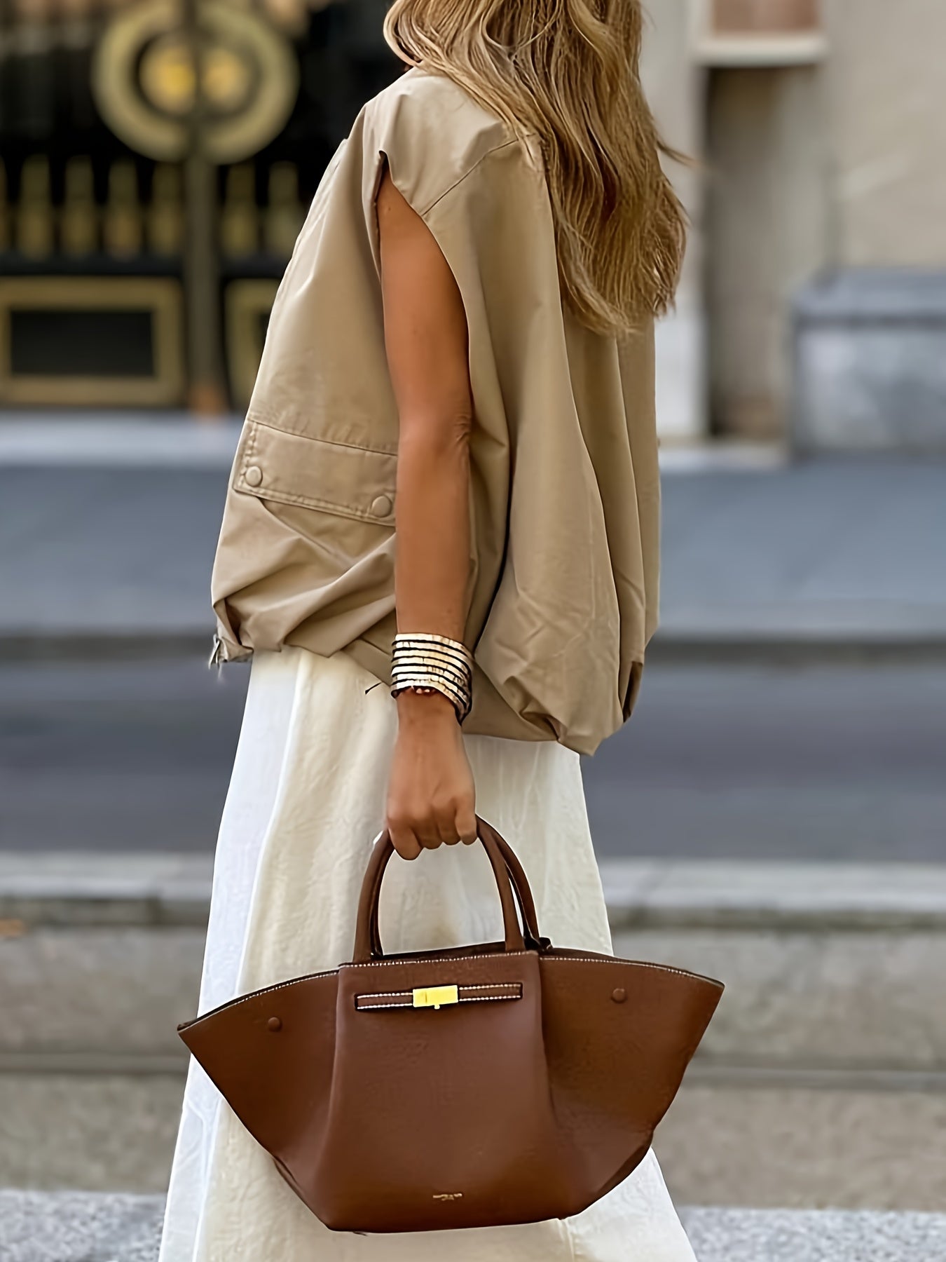 Faiga | Chic beige mouwloos vest voor dames met zakken