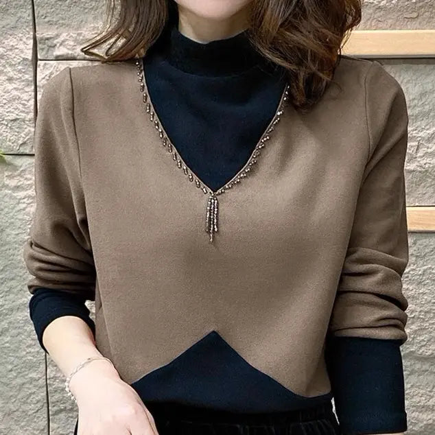 Calluna | Warme damesblouse met halve hoge hals en lange mouwen