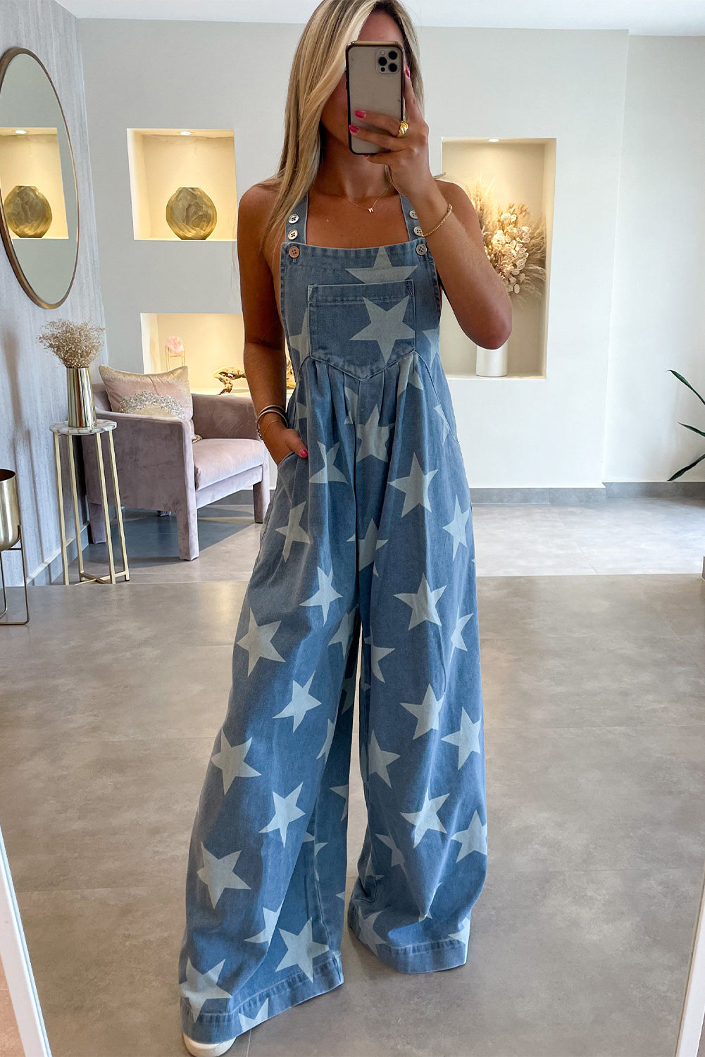 Inessa | Denim Overall met sterrenprint, geknoopte bandjes en geplooide wijde pijpen